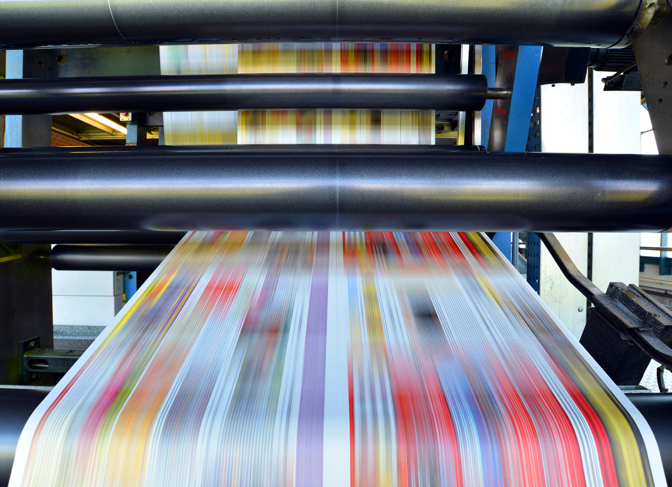 roll offset print machine in a large print shop for production of newspapers & magazines